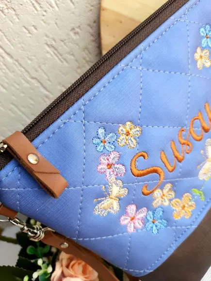 Necessaire floral G material sintético