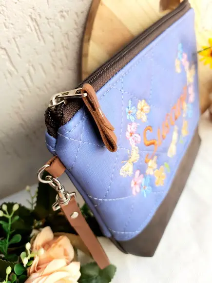 Necessaire floral G material sintético