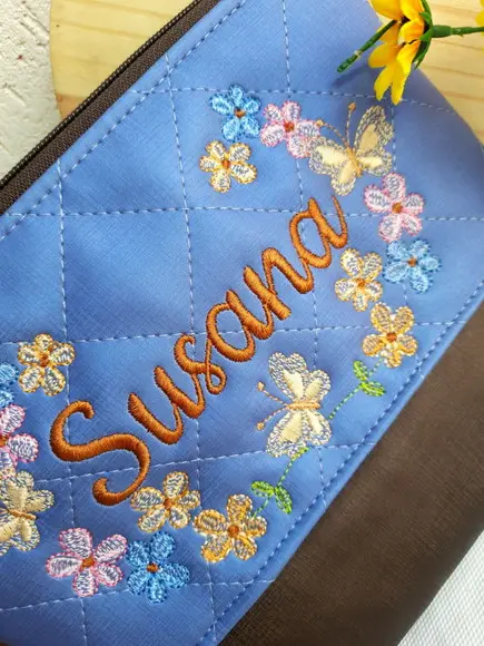 Necessaire floral G material sintético