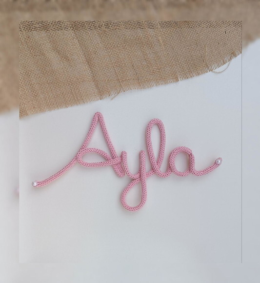 Ayla em Tricotin (valor Refere-se ao Nome)