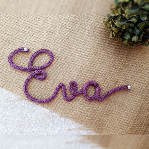 Eva em Tricotin (valor Refere-se ao Nome)