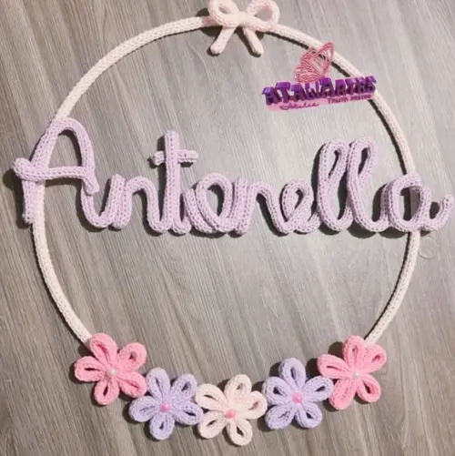 Porta Maternidade Lacinho e Flores em Tricotin