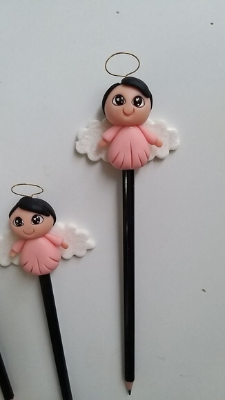 lápis com ponteiras anjinho