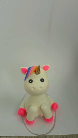 Topo vela unicornio