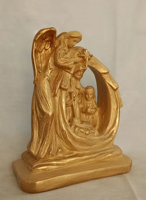 Presépio - família sob o anjo