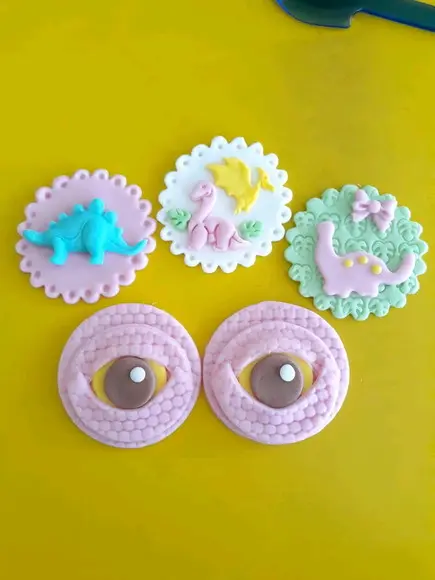 10 Apliques de açúcar 6cm Dinossauros Rosa