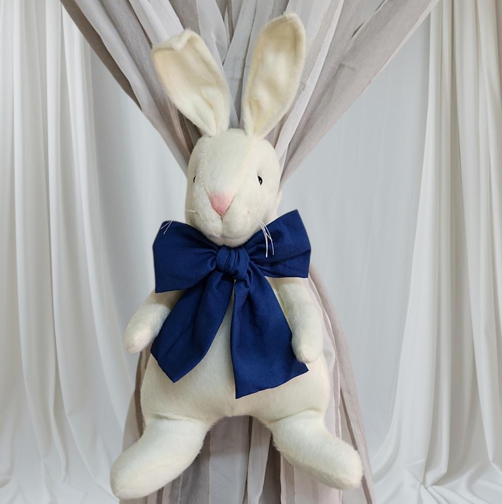 Coelho prendedor de cortina
