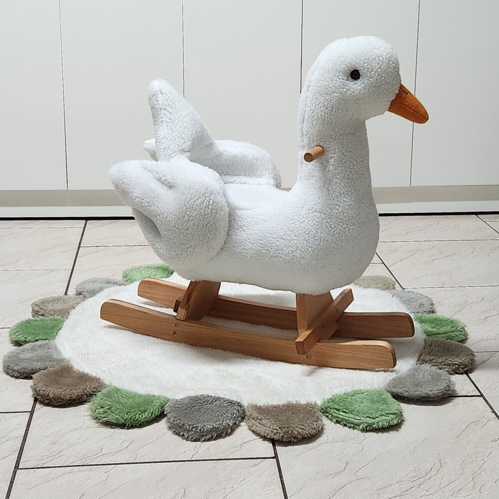 Brinquedo de balanço ganso