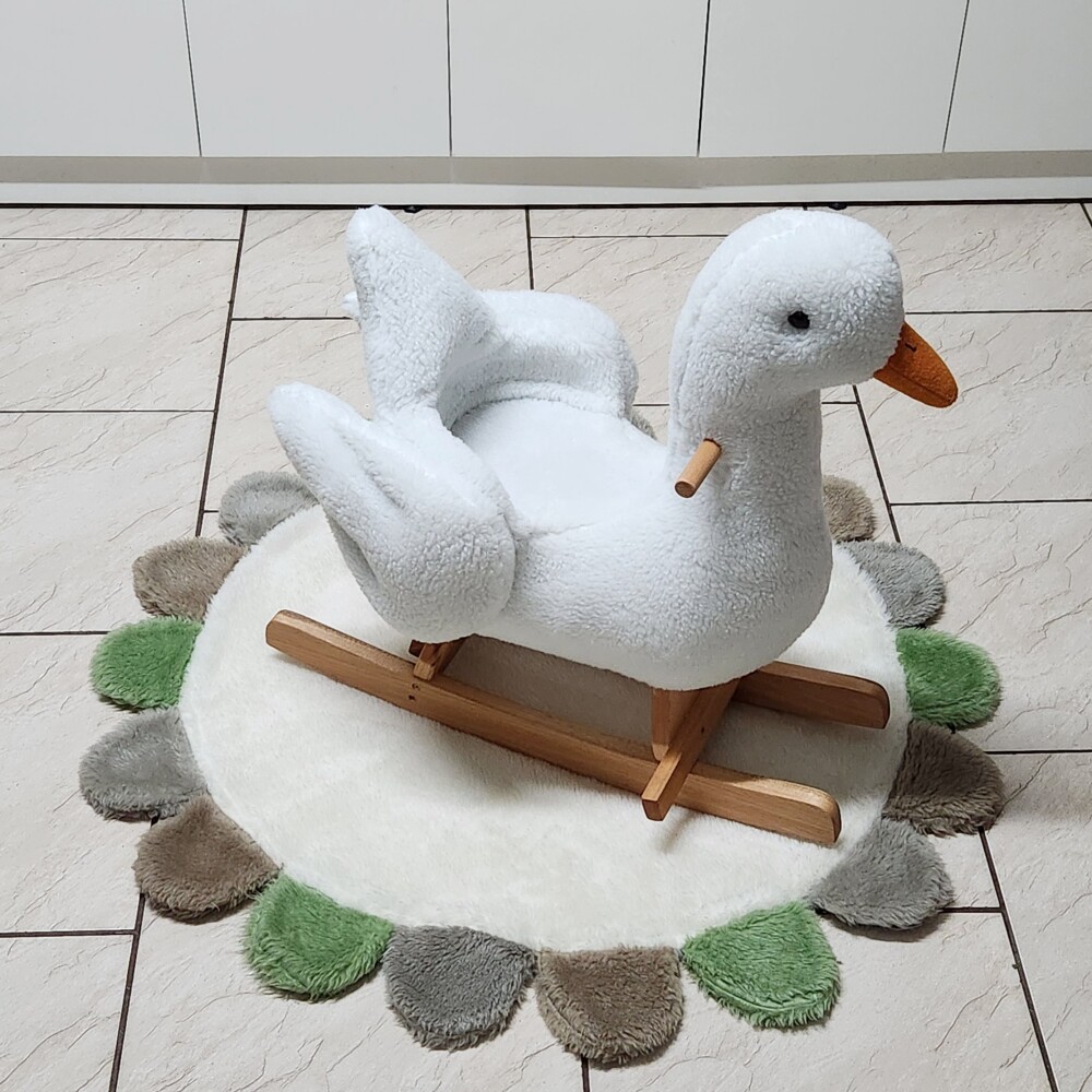 Brinquedo de balanço ganso