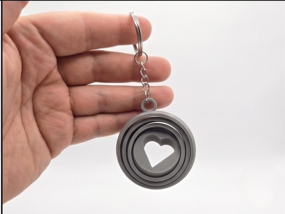 Chaveiro Fidget Coração Giratório - Presente Criativo Dia dos
