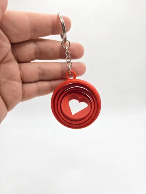 Chaveiro Fidget Coração Giratório - Presente Criativo Dia dos Namorados - Atacado mínimo 10