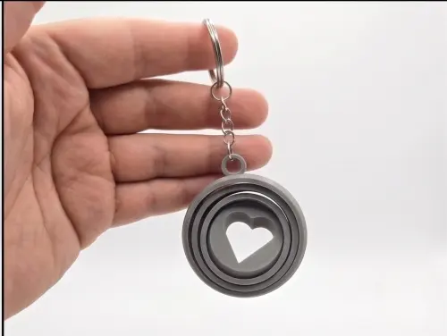 Chaveiro Fidget Coração Giratório - Presente Criativo Dia dos
