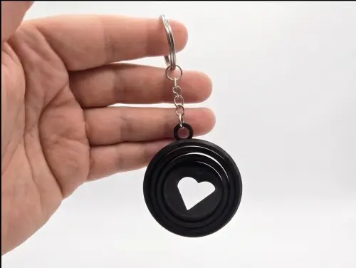 Chaveiro Fidget Coração Giratório - Presente Criativo Dia dos