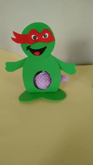 Tartaruga ninja porta bombom