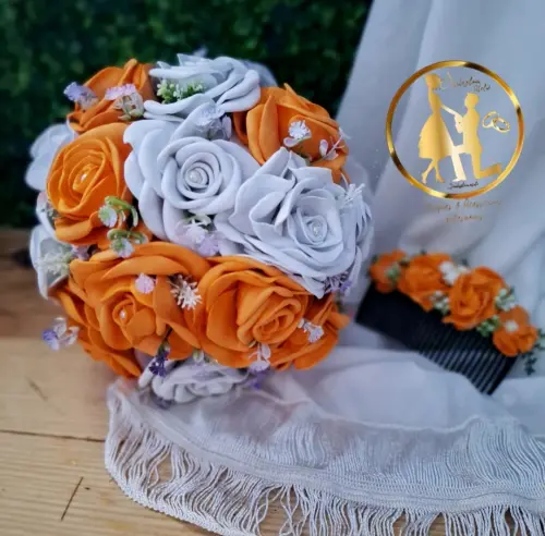 Buquê de noiva em tons laranja branco