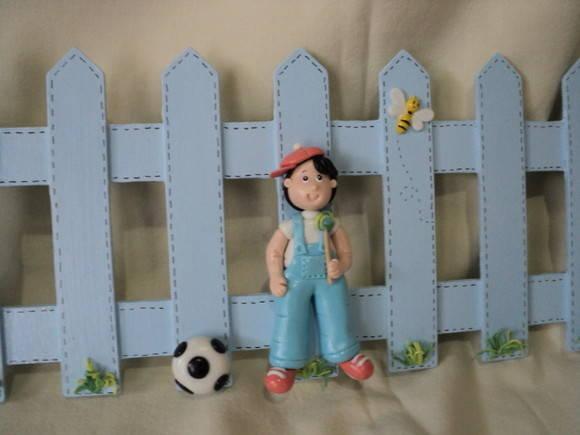 Border -cerquinha com menino em biscuit