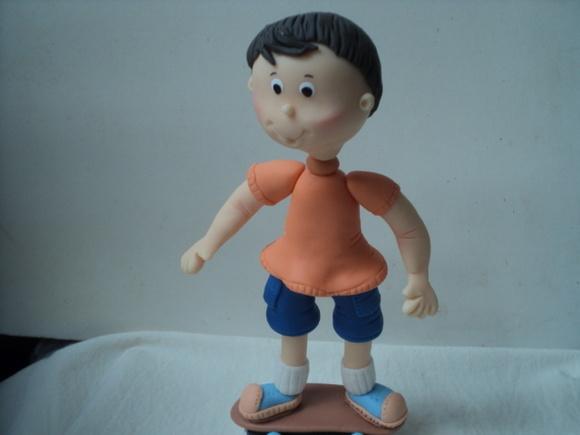 Topo Menino no Skate em Biscuit