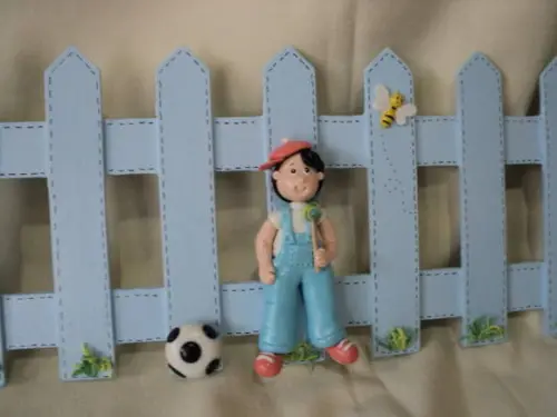 Border -cerquinha com menino em biscuit