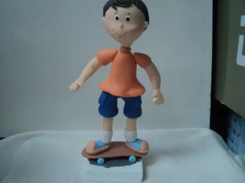 Topo Menino no Skate em Biscuit