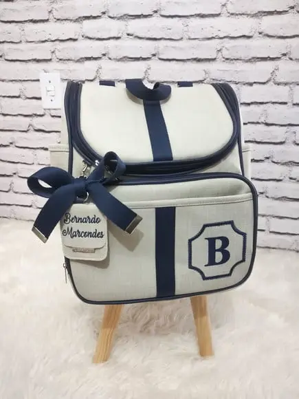 Mochila 2 em 1 linho luxo bege e azul marinho com tag