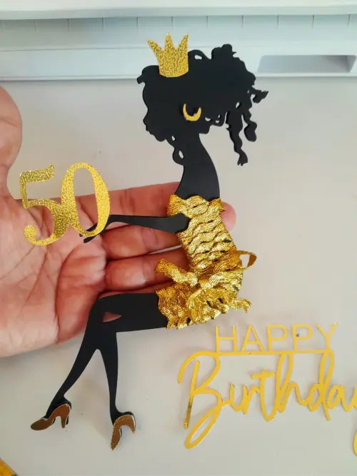 topo de bolo mulher sentada 50 anos Arquivo de Corte