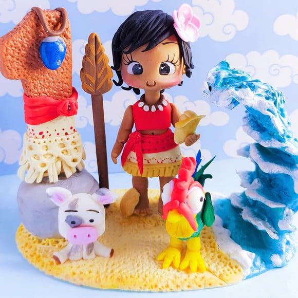 Topo de Bolo Moana em Biscuit