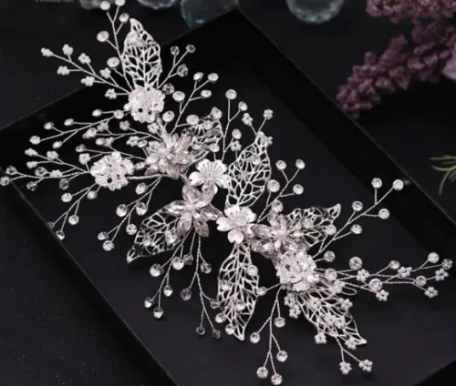 Arranjo de cabeça flores e folhas de strass prata