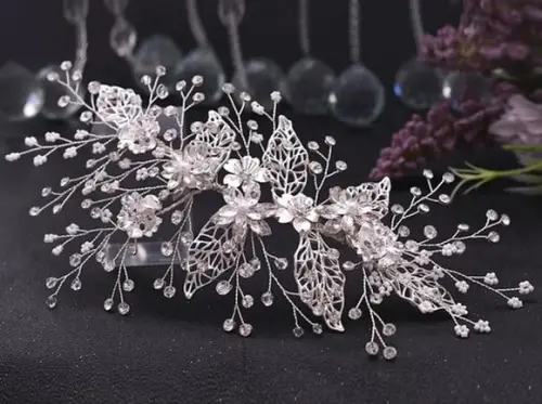 Arranjo de cabeça flores e folhas de strass prata