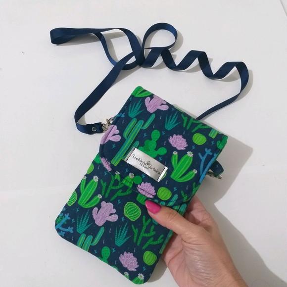 Bolsa Paulinha a tira colo porta celular