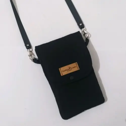Bolsa Paulinha a tira colo porta celular