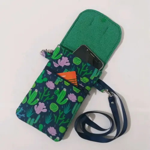 Bolsa Paulinha a tira colo porta celular