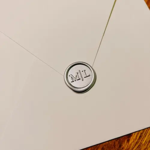 Lacre - M|l