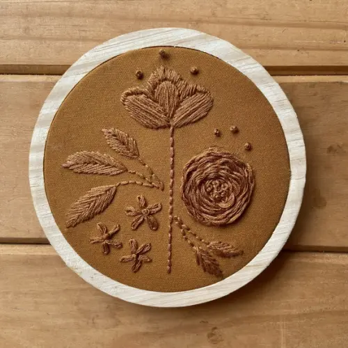 Composição de Bordados Terra