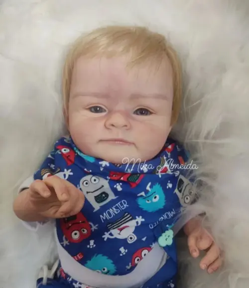 Bebê Reborn Noah menino loiro corpo silicone