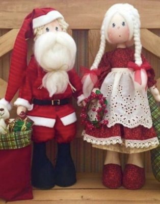 Casal de Papai Noel e Mamãe Noel